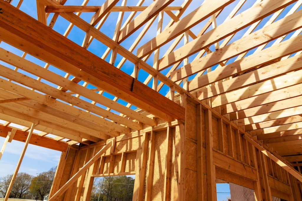 A custom home being framed during construction